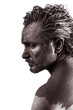 Anger, Dreaming, man covered in mud, naked, in profile, dirty sk