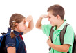 Photo: School kids isolated over white background School kids isolated over white background