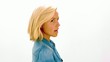 Cute blonde turning coyly and looking surprised