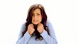 Pretty brunette cowering with fear