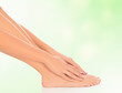 Photo: woman feet and hands on floor, blurred background woman feet and hands on floor, blurred background