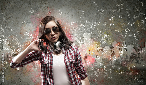 Photo: Young woman with headphones Young woman with headphones