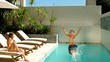 Little boy diving into the swimming pool