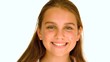 Video: Girl smiling against white background Girl smiling against white background