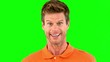 Handsome man saying yes with his head on green screen