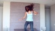 Video: Pretty brunette jumping on her bed Pretty brunette jumping on her bed
