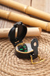 Foto: Ship ropes and compass on wooden background Ship ropes and compass on wooden background