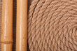 Foto: background of marine rope, bamboo sticks and wood background of marine rope, bamboo sticks and wood