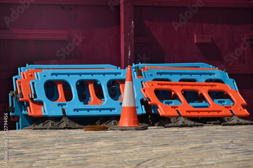 Photo: Road work barrier and cone Road work barrier and cone