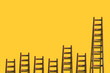 Old ladders on blank yellow wall
