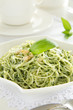 Spaghetti with pesto sauce.