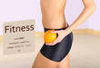 Foto: Beautiful female figure with orange on light background Beautiful female figure with orange on light background