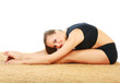 Foto: Yoong woman doing stretching excersises Yoong woman doing stretching excersises
