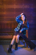 Foto: Mixed Race Young Adult Woman Portrait Sitting on Wood Bench Mixed Race Young Adult Woman Portrait Sitting on Wood Bench