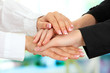United hands, on bright background