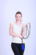 Foto: Beautiful young woman with skipping rope Beautiful young woman with skipping rope