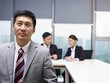 Photo: asian businessman praying for help asian businessman praying for help