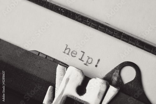 Photo: Help written on old typewriter. Help written on old typewriter.