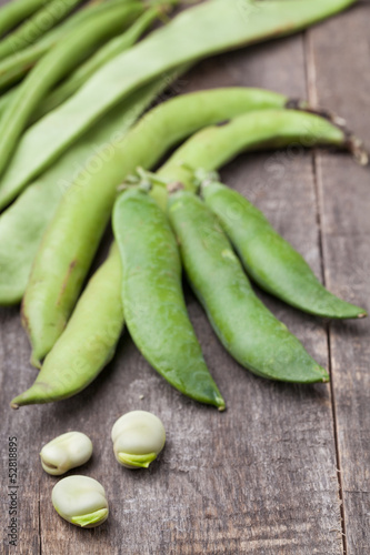 Photo: Green vegetables on a white background. Green vegetables on a white background.