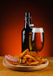 grilled sausage, french fries and beer