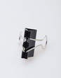 Black clerical clip for paper