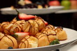 Eclair decorated with strawberry
