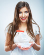 Portrait of young smiling woman hold white paper ship. Female m
