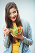 Young woman eating salad isolated