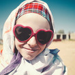 Under the bright desert sun, female funny portrait