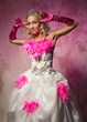 Photo: Lovely woman in bridal dress posing indoors Lovely woman in bridal dress posing indoors