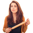 woman holds rolling-pin