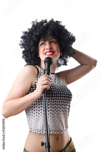 Photo: Pop star with mic on white Pop star with mic on white