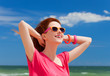 Redhead teen girl on the beach