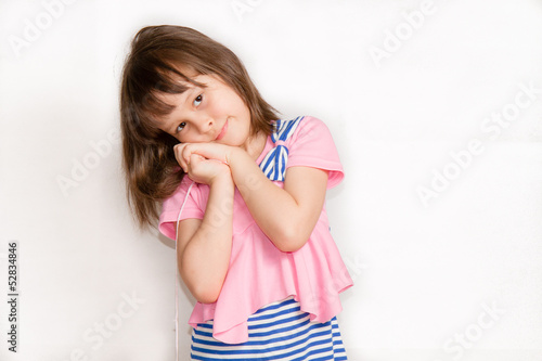 Photo: Child playing with string Child playing with string