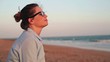 Video: Young pensive beautiful businesswoman on the beach Young pensive beautiful businesswoman on the beach