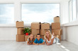 Happy woman and kids in their new home