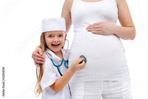 Photo: Pregnant woman expecting the baby with her child Pregnant woman expecting the baby with her child