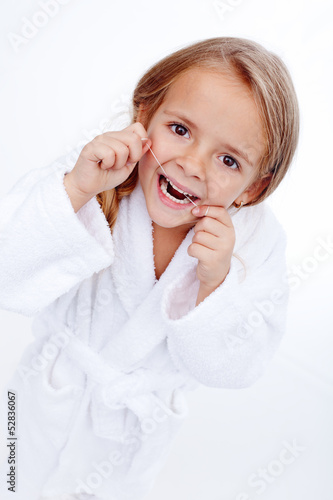 Photo: Little girl flossing Little girl flossing