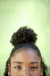 Portrait of happy young african girl looking at camera, smiling
