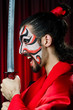 Man with sword and face mask