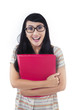 Happy female student bring red folder - isolated