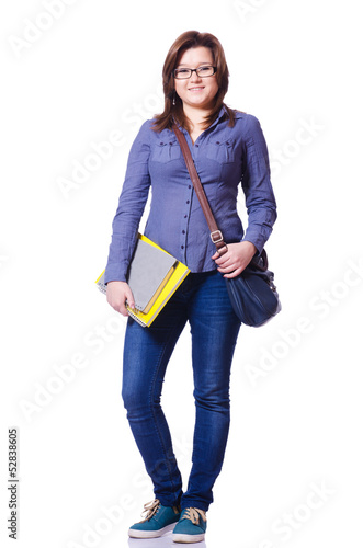 Photo: Girl student with books on white Girl student with books on white