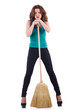 Foto: Young woman with broom isolated on white Young woman with broom isolated on white