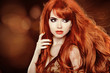 Photo: Red Hair. Beautiful Woman. Healthy Long Hair. Beauty Model Girl. Red Hair. Beautiful Woman. Healthy Long Hair. Beauty Model Girl.