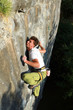A man climbs a wall.