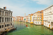 Photo: Colorful canal of Venice with houses and boat. View from Rialto Colorful canal of Venice with houses and boat. View from Rialto