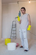 Worker with a power drill