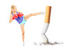 Foto: Female with boxing gloves kicking with her leg a cigarrette butt Female with boxing gloves kicking with her leg a cigarrette butt
