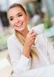 Woman having a cup of coffee