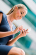 Business woman sending text message
